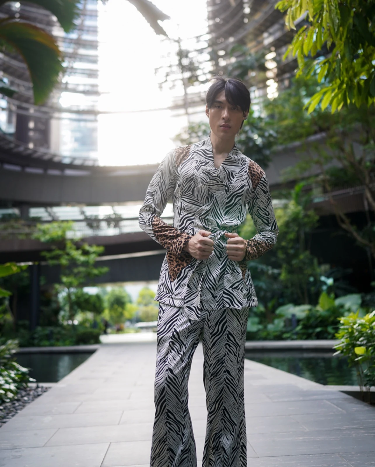 Zebra-print suit with leopard contrast cuffs