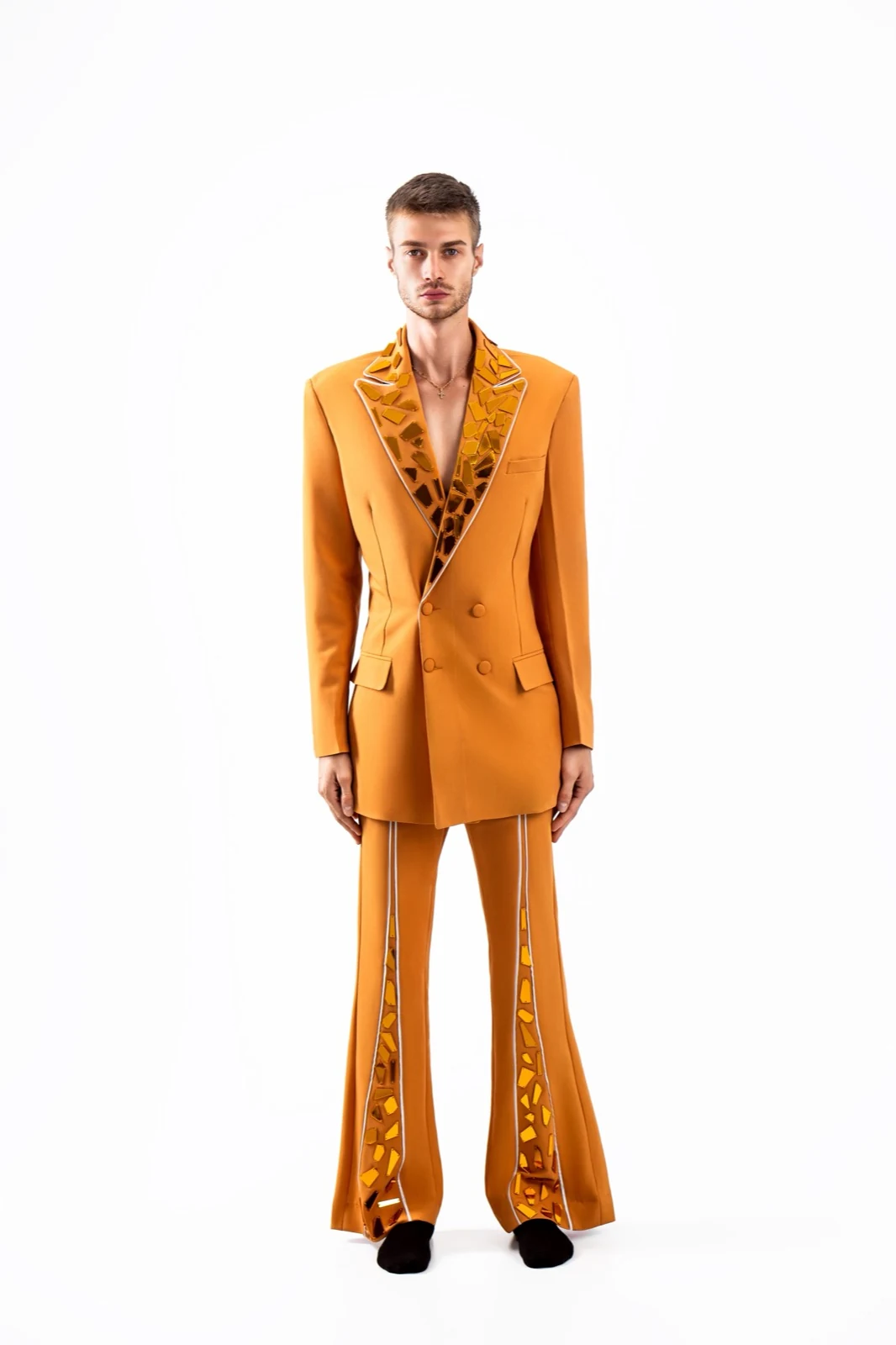 Burnt-orange double-breasted suit, mirror-shard mosaic lapels — atelier sample