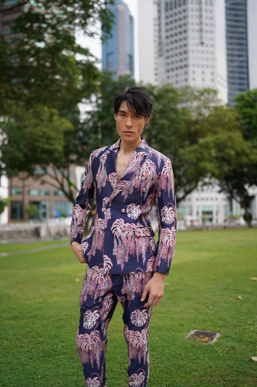 Navy and pink monstera-leaf print suit