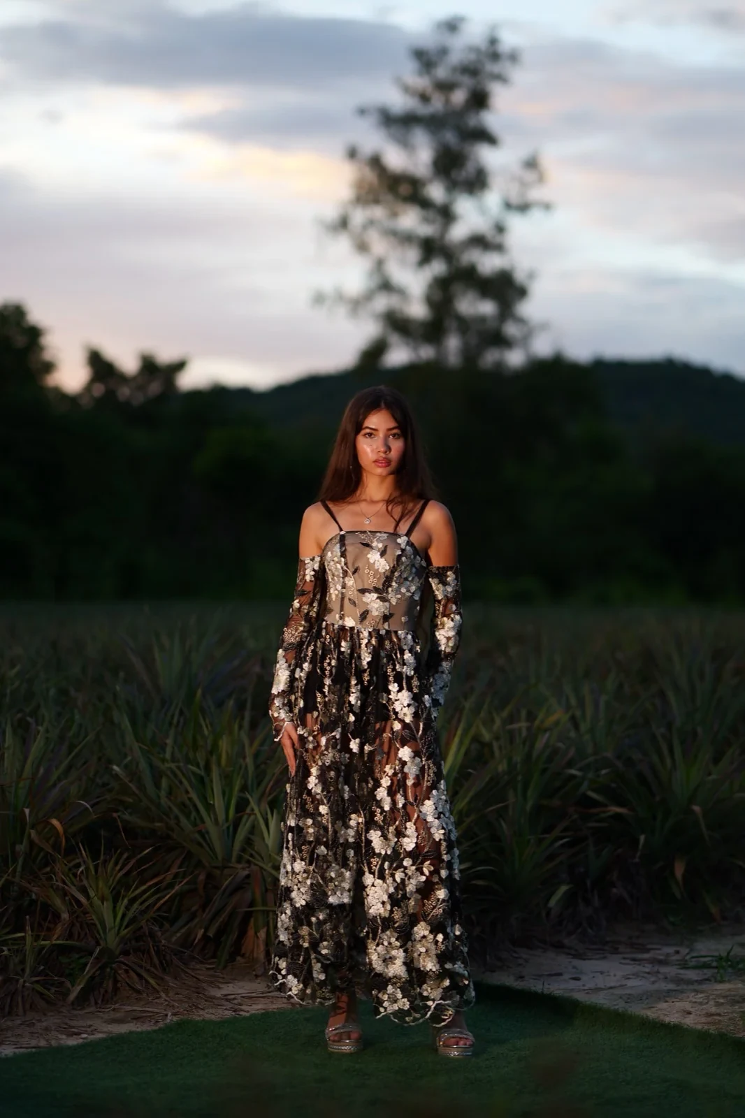 Floral long dress, editorial garden setting — atelier sample